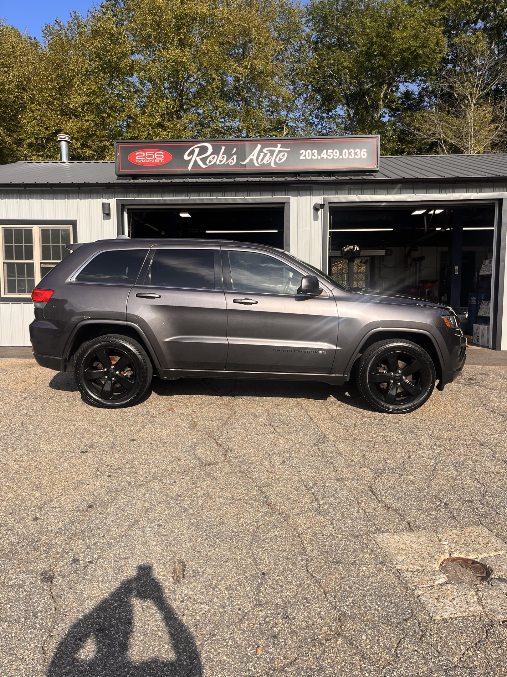 NEW ARRIVAL!! 2014 JEEP GRAND CHEROKEE ALTITUDE!!! One owner!! PERFECT CARFAX!!! Loaded with navigation, moonroof, heated seats, heated steering wheel, 20” wheels, remote start and much much more! Extensive maintenance records!!! Only 112,400 miles and priced to sell! Won’t last at ONLY $12,900!!!