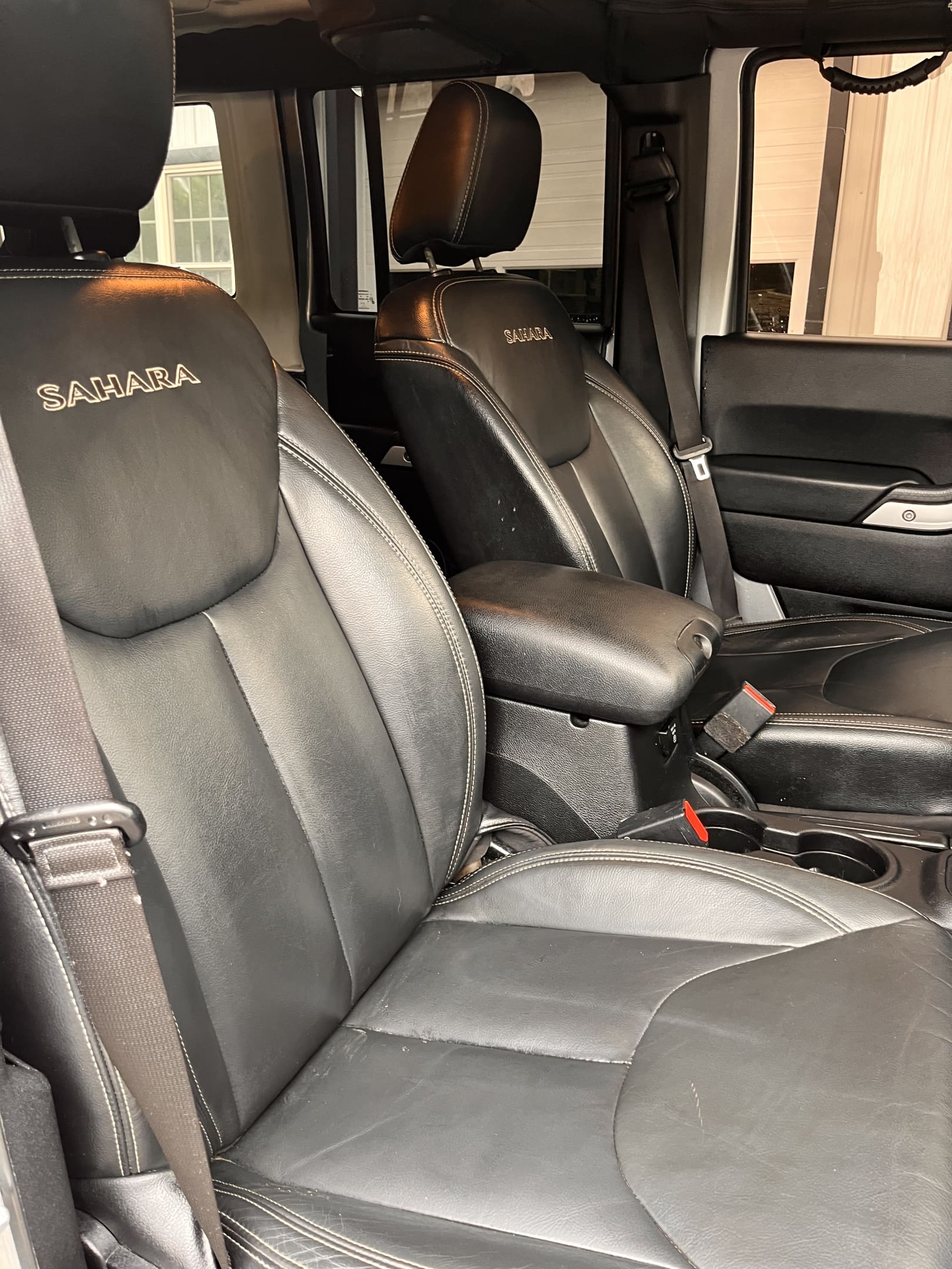 2016 JEEP WRANGLER UNLIMITED SAHARA!! Runs and drives great!! Heated leather seats! Backup camera! Remote start and much more! Only 100,400 miles! Recent wheels, tires and lift!! Won’t last at ONLY $19,900!!