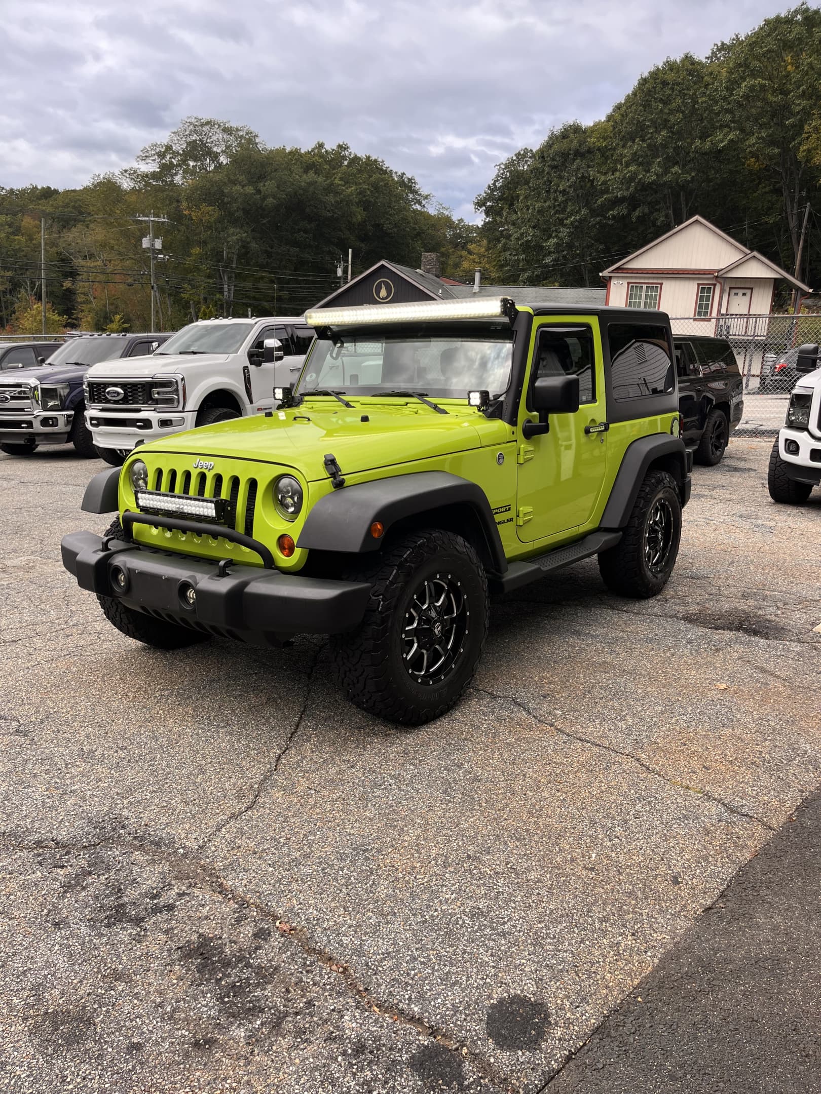 NEW ARRIVAL!!! 2012 JEEP WRANGLER SPORT!!! Many extras!!! Fuel wheels, backup camera, Bluetooth, remote start and much much more!! ONLY 92k miles! Clean carfax! A must see! Won’t last at ONLY $13,900!!!