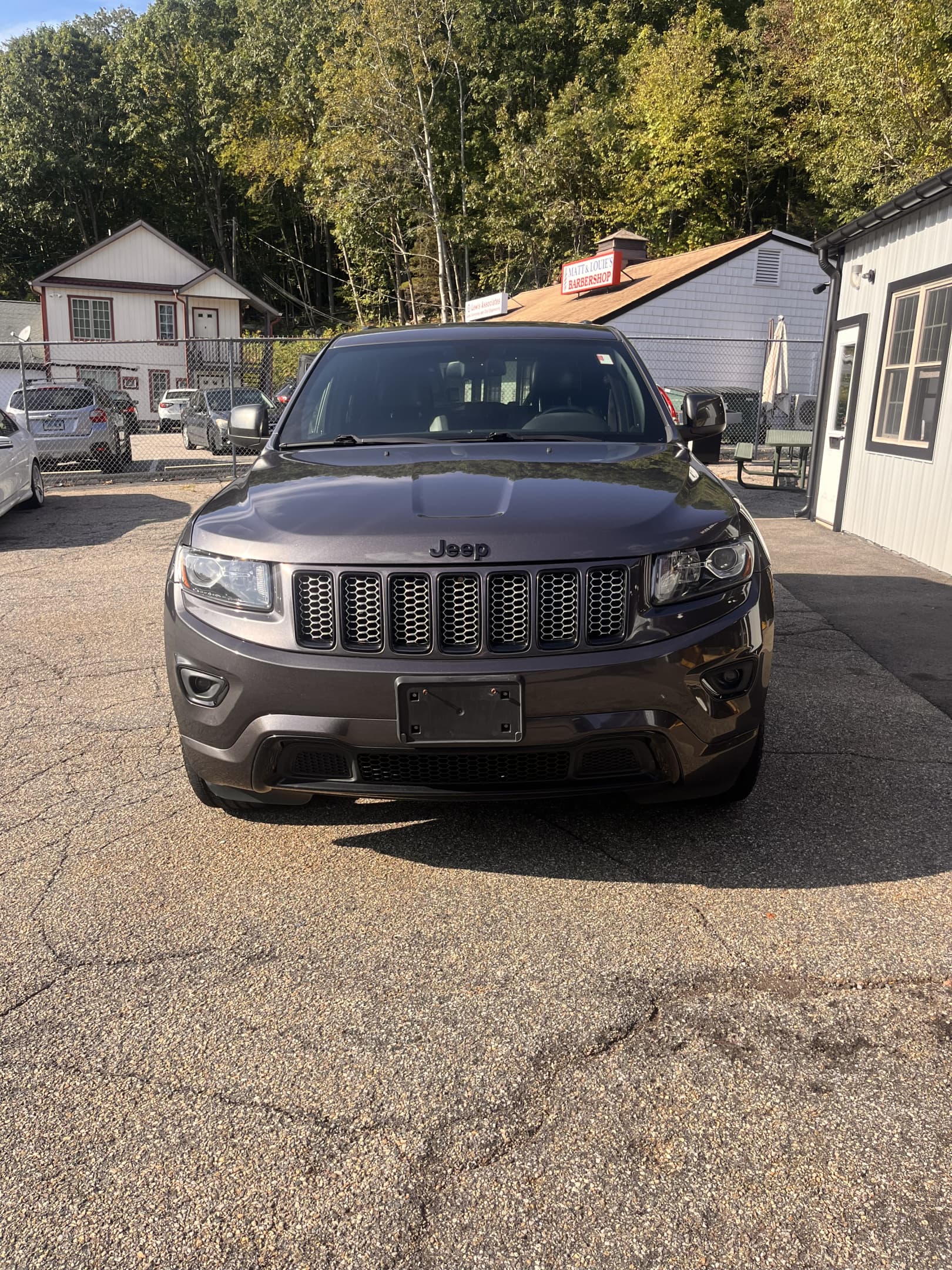 NEW ARRIVAL!! 2014 JEEP GRAND CHEROKEE ALTITUDE!!! One owner!! PERFECT CARFAX!!! Loaded with navigation, moonroof, heated seats, heated steering wheel, 20” wheels, remote start and much much more! Extensive maintenance records!!! Only 112,400 miles and priced to sell! Won’t last at ONLY $12,900!!!