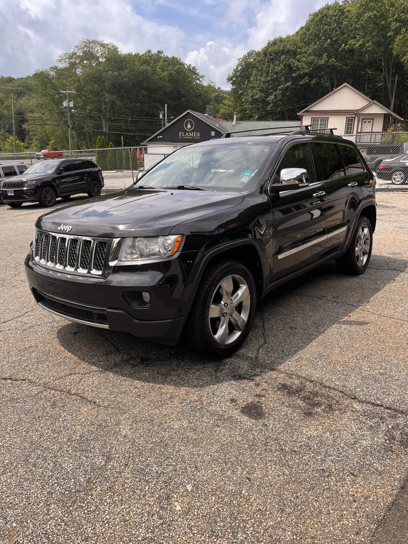NEW ARRIVAL!! 2013 JEEP GRAND CHEROKEE OVERLAND!!! Clean carfax!!! Loaded with navigation, heated and cooled front seats, heated steering wheel, heated rear seats, pano roof, remote start and much much more!! Extensive maintenance records!! 108k miles!! Runs and drives like new!! Won’t last at only $10,900!!