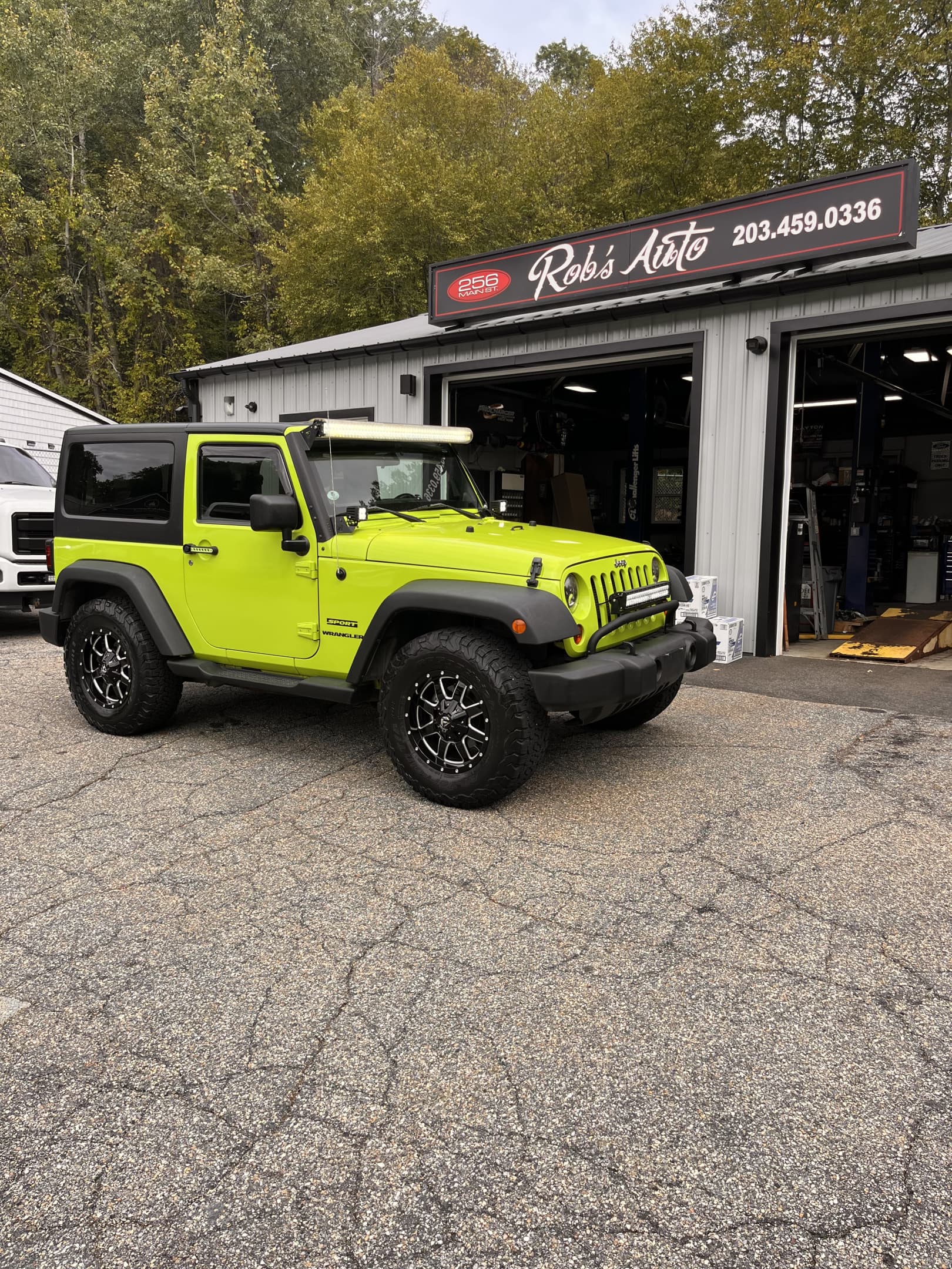 NEW ARRIVAL!!! 2012 JEEP WRANGLER SPORT!!! Many extras!!! Fuel wheels, backup camera, Bluetooth, remote start and much much more!! ONLY 92k miles! Clean carfax! A must see! Won’t last at ONLY $13,900!!!
