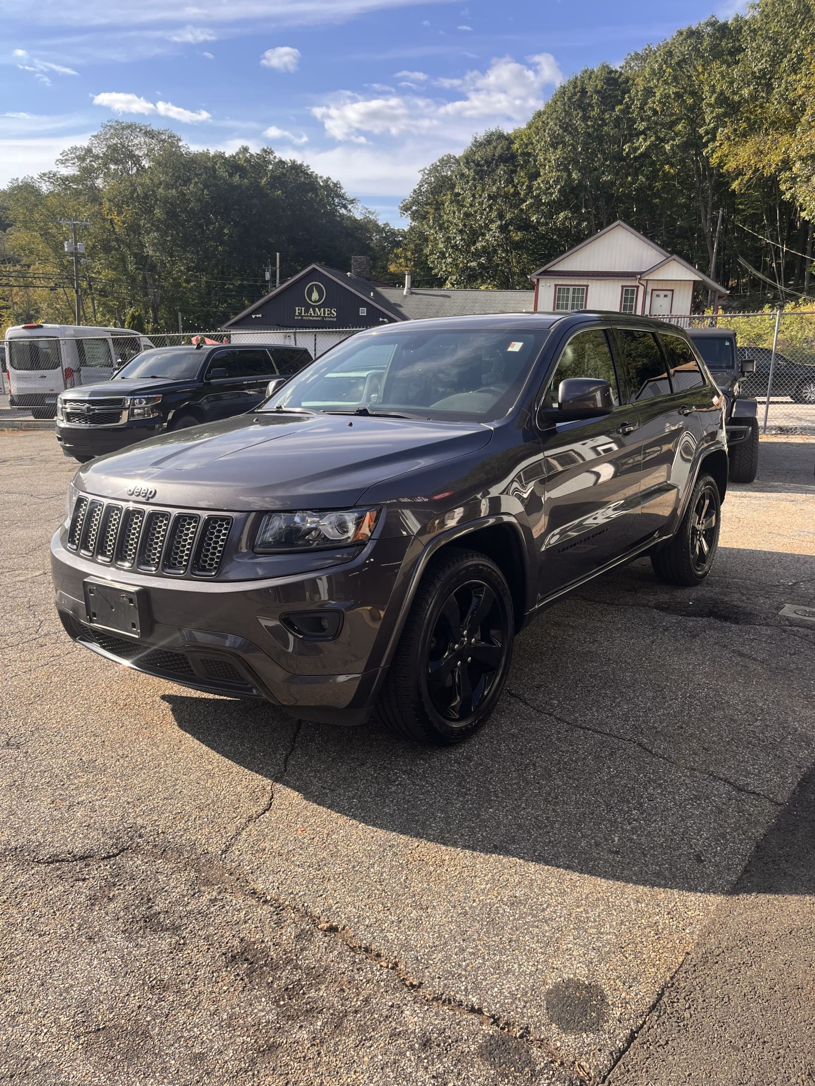 NEW ARRIVAL!! 2014 JEEP GRAND CHEROKEE ALTITUDE!!! One owner!! PERFECT CARFAX!!! Loaded with navigation, moonroof, heated seats, heated steering wheel, 20” wheels, remote start and much much more! Extensive maintenance records!!! Only 112,400 miles and priced to sell! Won’t last at ONLY $12,900!!!