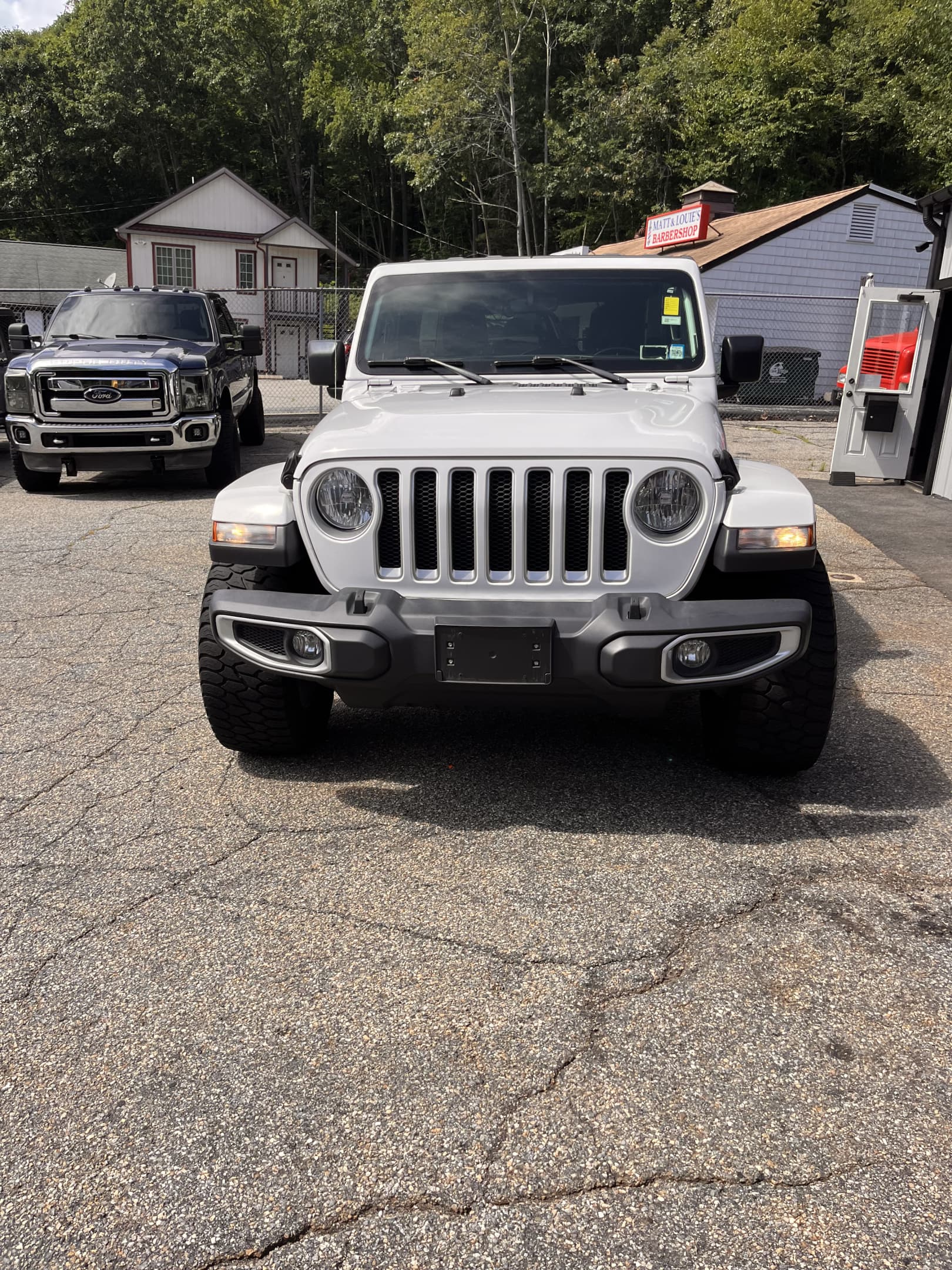 NEW ARRIVAL!! 2021 JEEP WRANGLER UNLIMITED SAHARA!! One owner!! ONLY 47,700 miles!! All the right options!! Navigation, back up camera, remote start, heated seats, heated steering wheel, Alpine premium sound and much more!! Also comes with a soft top!! Won’t last at $33,900!!