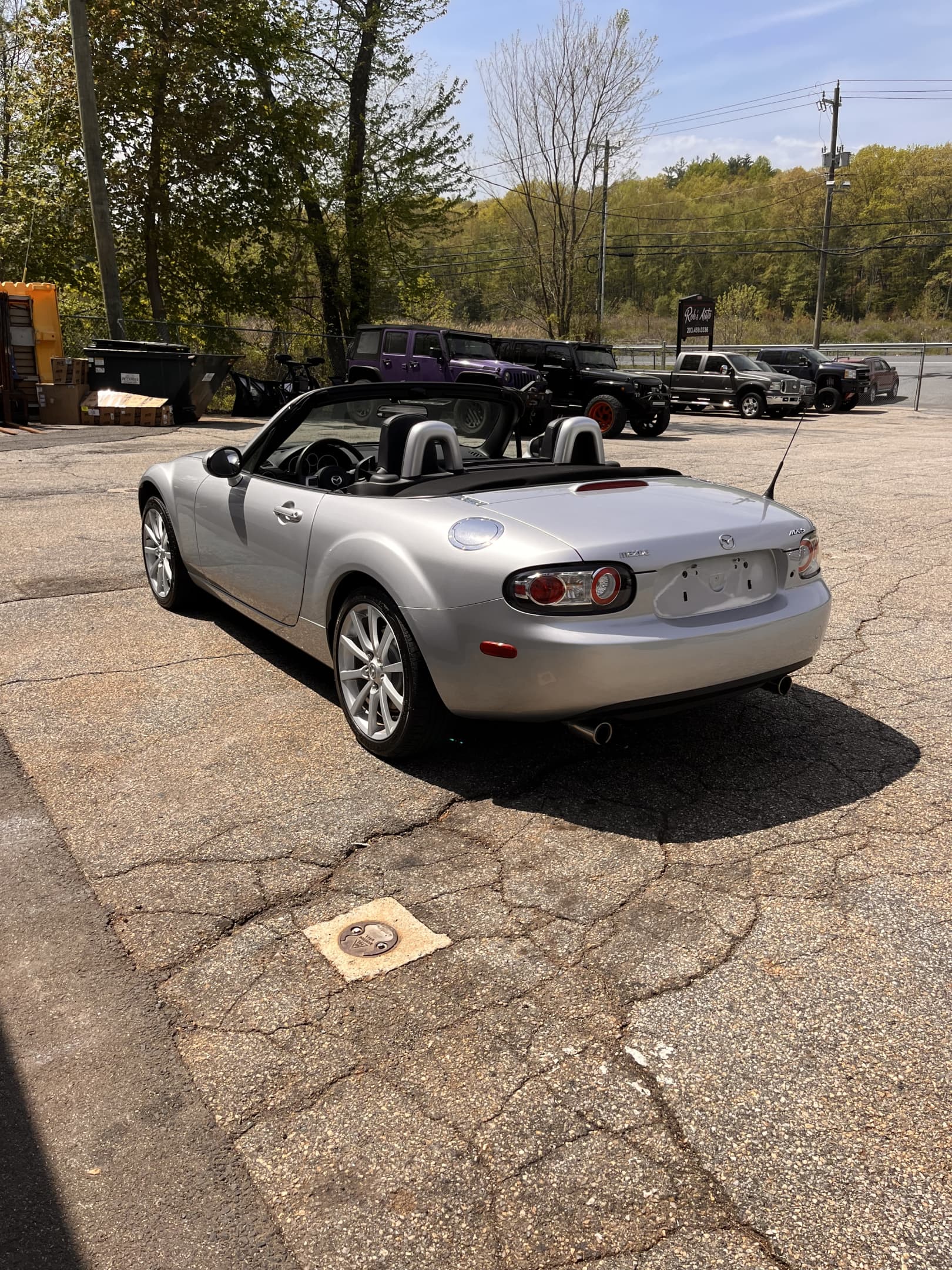 NEW ARRIVAL!! 2006 MAZDA MX-5 MIATA TOURING!! One owner car! Heated leather seats, 6 disc BOSE STEREO, 6 speed and much more! ELDERLY OWNED! Comes with all records, books and keys! ONLY 10,196 miles!! Clean carfax!! Convertible season is here!! Won’t last at only $15,900!!