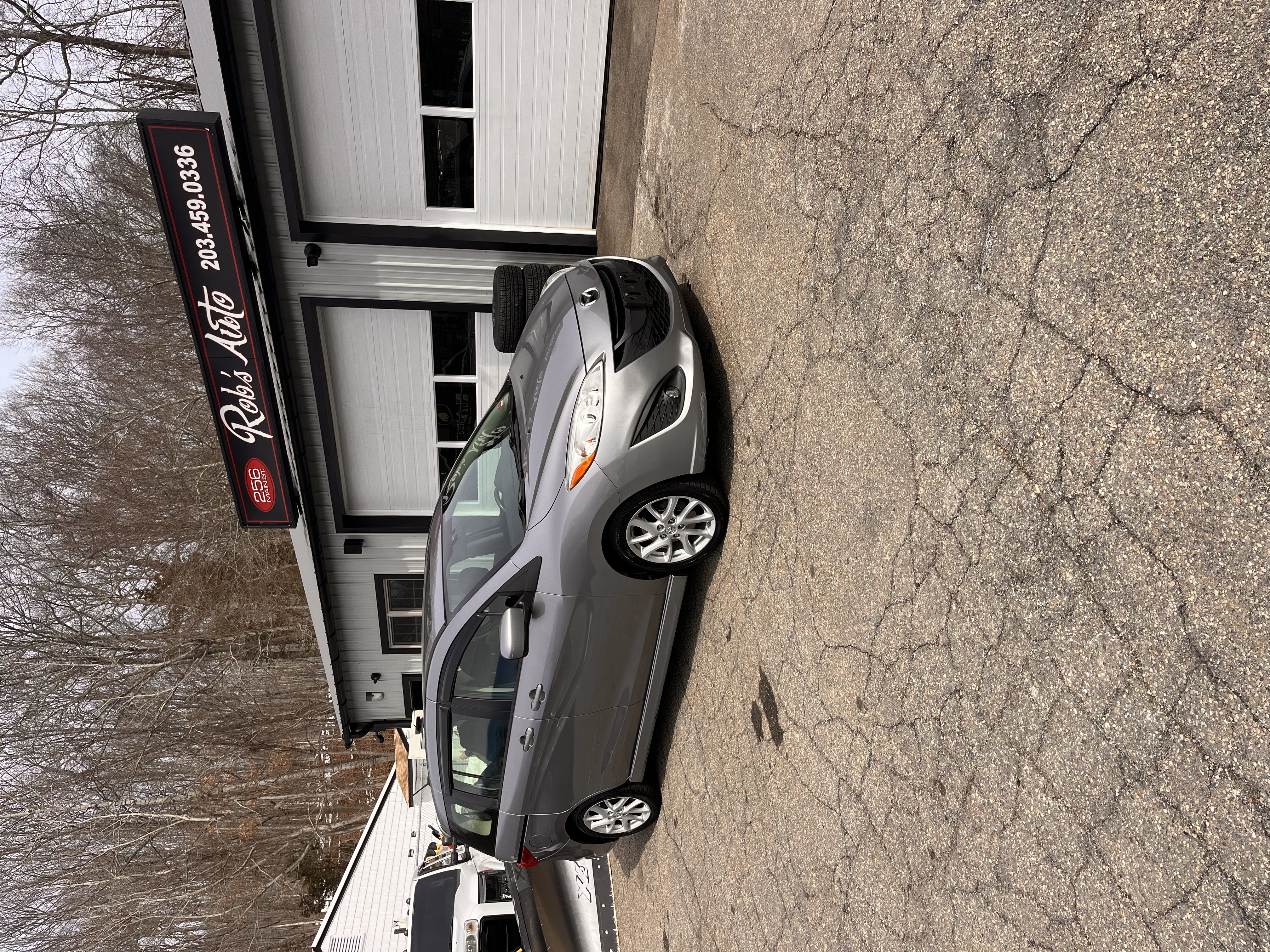 NEW ARRIVAL!! 2012 MAZDA MAZDA5 GRAND TOURING!! Clean carfax!! Loaded with leather, heated seats, moonroof, Bluetooth and much more! 6 passenger seating with third row! Two sets of wheels and tires (winter and summer) only 124k miles!! Runs and drives great!! A bargain at ONLY $6,700!!! Won’t last!!