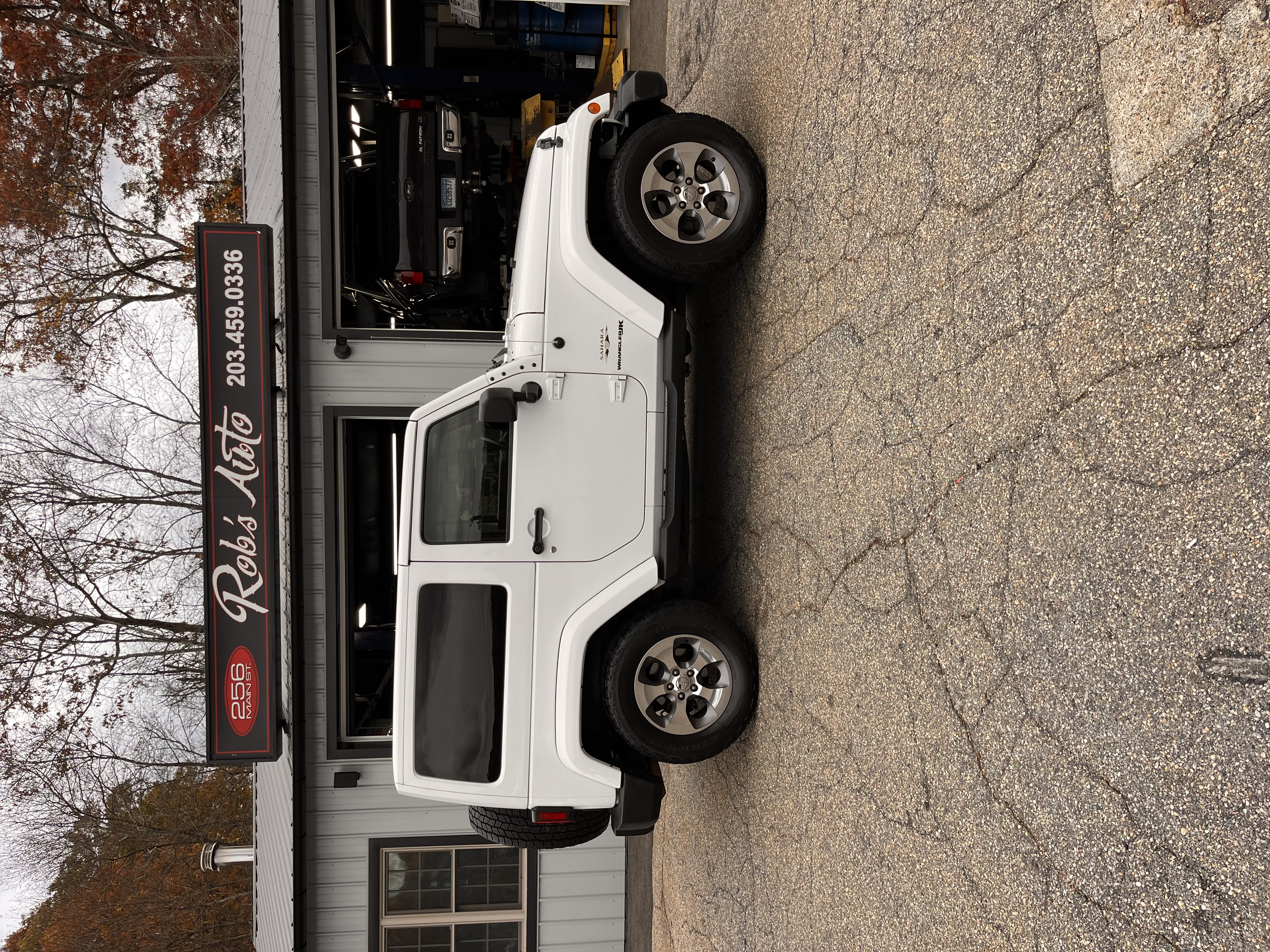 NEW ARRIVAL!!! 2018 JEEP WRANGLER JK SAHARA!! Clean carfax!! All the right options! Body color matching 3 piece hardtop, alpine premium 9 speaker system with all weather subwoofer, Bluetooth, remote start and much more!! 110k miles! Runs and drives like new. Won’t last at $17,900! Unlimited miles extended warranty available!!