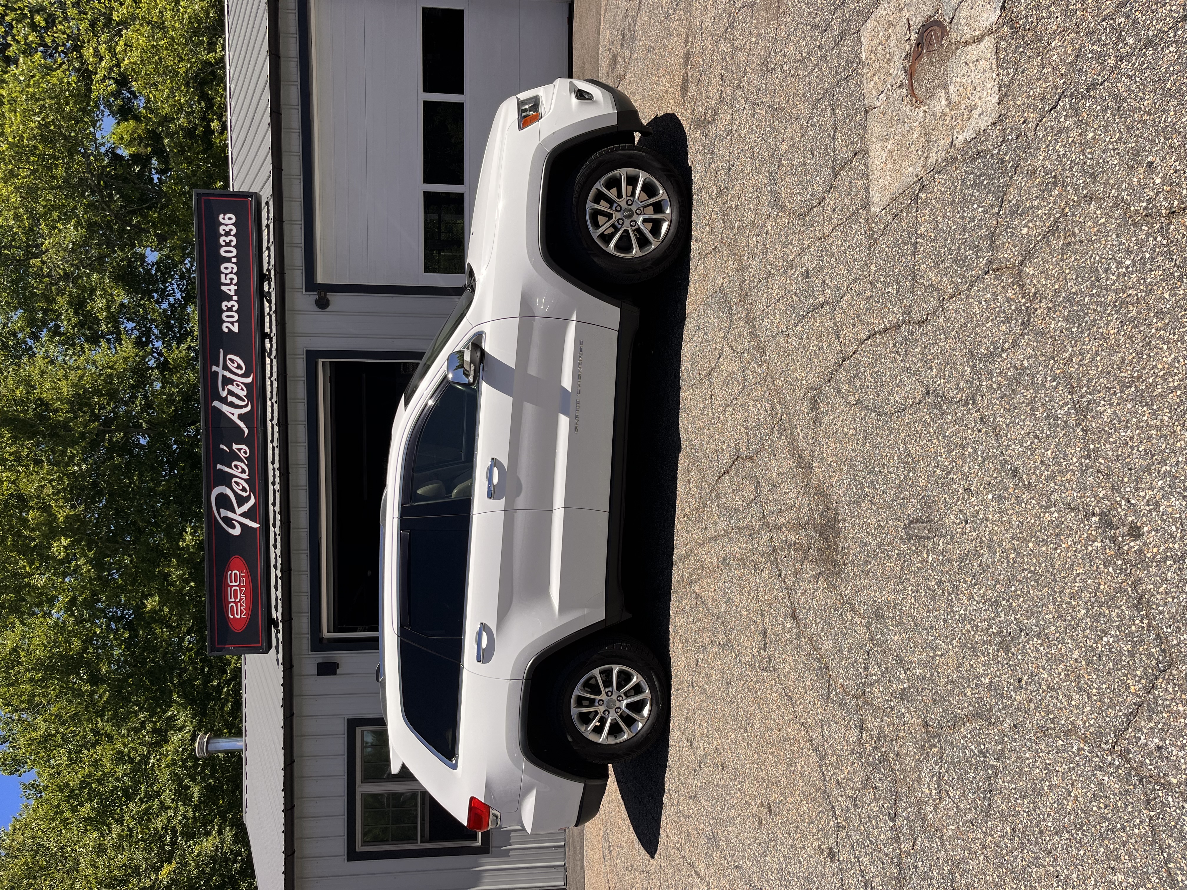 NEW ARRIVAL!!! 2014 JEEP GRAND CHEROKEE LIMITED!! Only 116k miles!! Loaded with navigation, remote start, heated front and rear seats, heated steering wheel, Bluetooth, backup camera and much much more!! Won’t last at ONLY $9,900!!!