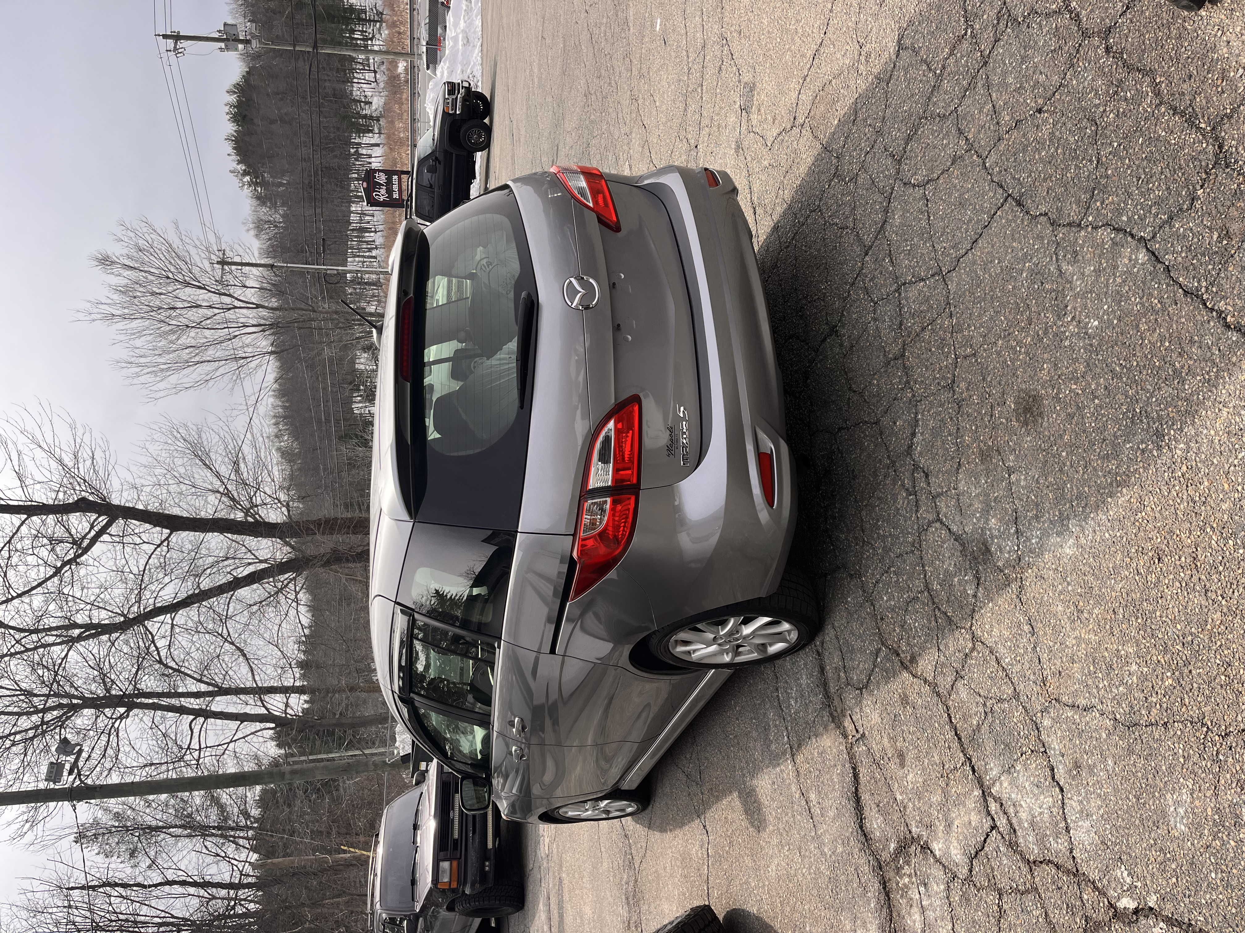 NEW ARRIVAL!! 2012 MAZDA MAZDA5 GRAND TOURING!! Clean carfax!! Loaded with leather, heated seats, moonroof, Bluetooth and much more! 6 passenger seating with third row! Two sets of wheels and tires (winter and summer) only 124k miles!! Runs and drives great!! A bargain at ONLY $6,700!!! Won’t last!!