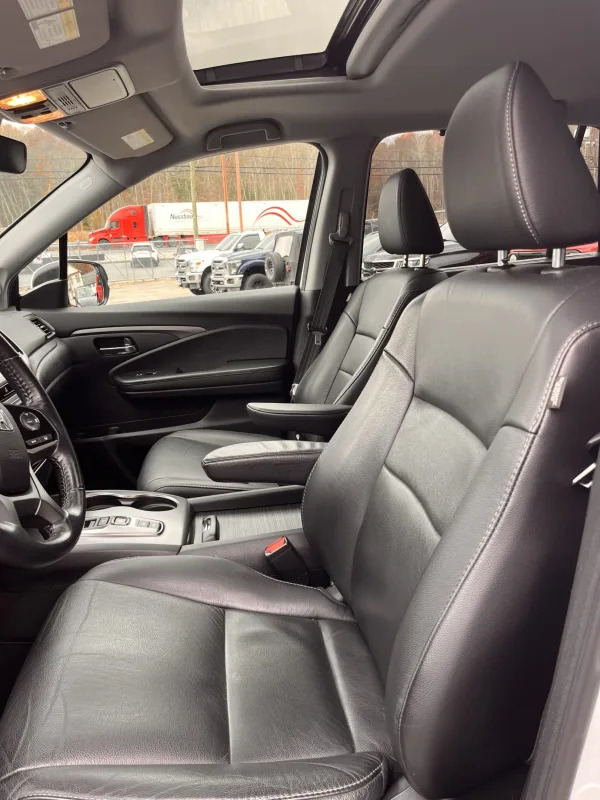 NEW ARRIVAL!! 2021 HONDA PILOT EX-L!! One owner car!! Clean carfax!! The definition of reliability!! With just under 60k miles this Pilot is not even broken in! Loaded with heated leather seats, moonroof, third row, remote start, backup camera and much much more! AWD! Priced below retail at only $26,900!! Won’t last!!