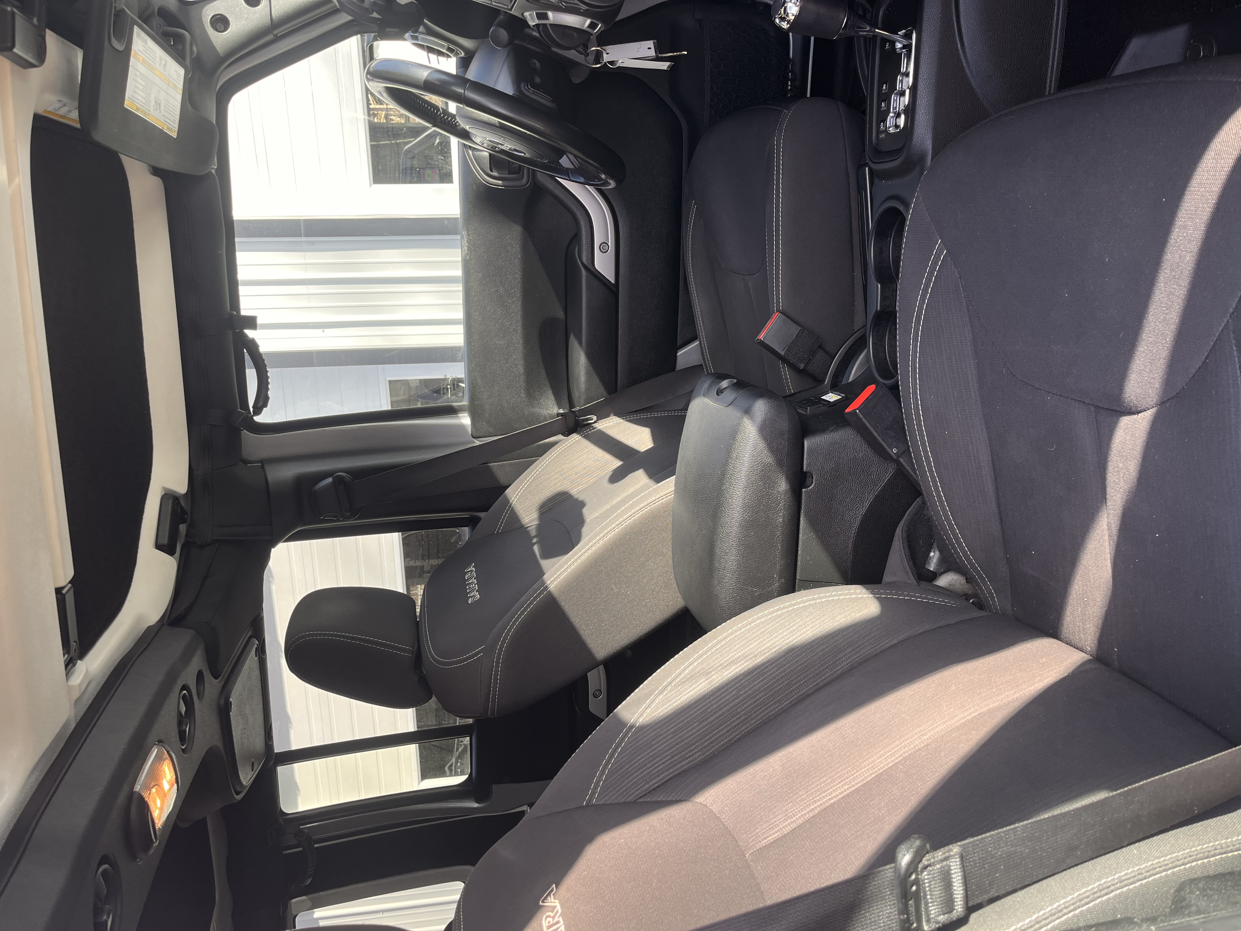 NEW ARRIVAL!!! 2017 JEEP WRANGLER UNLIMITED SAHARA!!! Clean carfax! As clean as you will find! ONLY 62,500 miles!! All the right options! Color match hard top with headliner for a quieter ride!!! Definitely won’t last at $22,900!!!