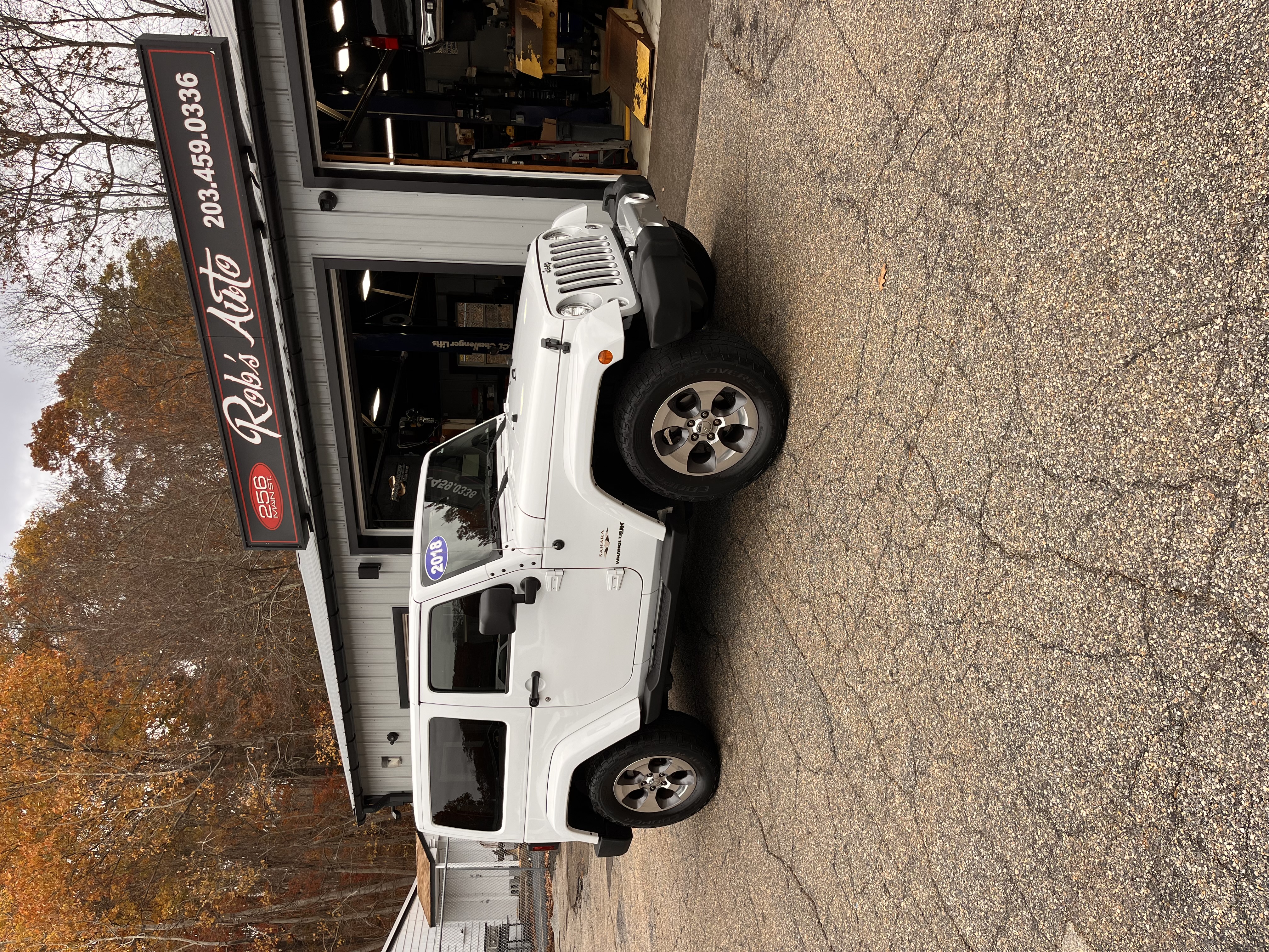 NEW ARRIVAL!!! 2018 JEEP WRANGLER JK SAHARA!! Clean carfax!! All the right options! Body color matching 3 piece hardtop, alpine premium 9 speaker system with all weather subwoofer, Bluetooth, remote start and much more!! 110k miles! Runs and drives like new. Won’t last at $17,900! Unlimited miles extended warranty available!!