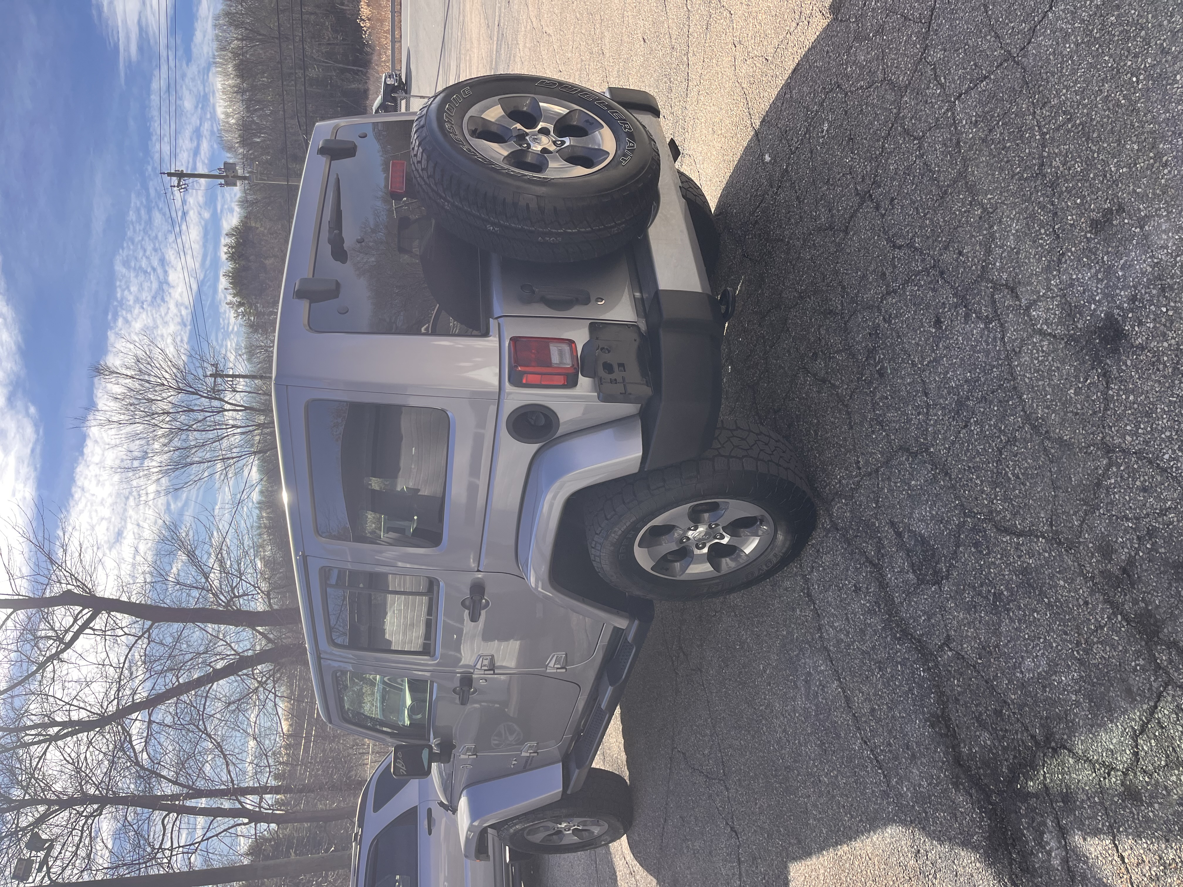 NEW ARRIVAL!!! 2017 JEEP WRANGLER UNLIMITED SAHARA!!! Clean carfax! As clean as you will find! ONLY 62,500 miles!! All the right options! Color match hard top with headliner for a quieter ride!!! Definitely won’t last at $22,900!!!